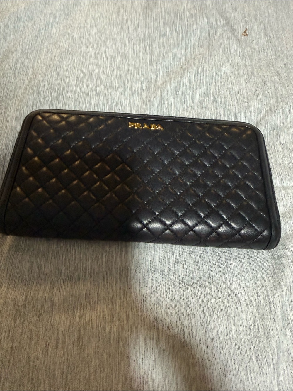 Prada Black Quilted Leather Zip Wallet with Gold Logo